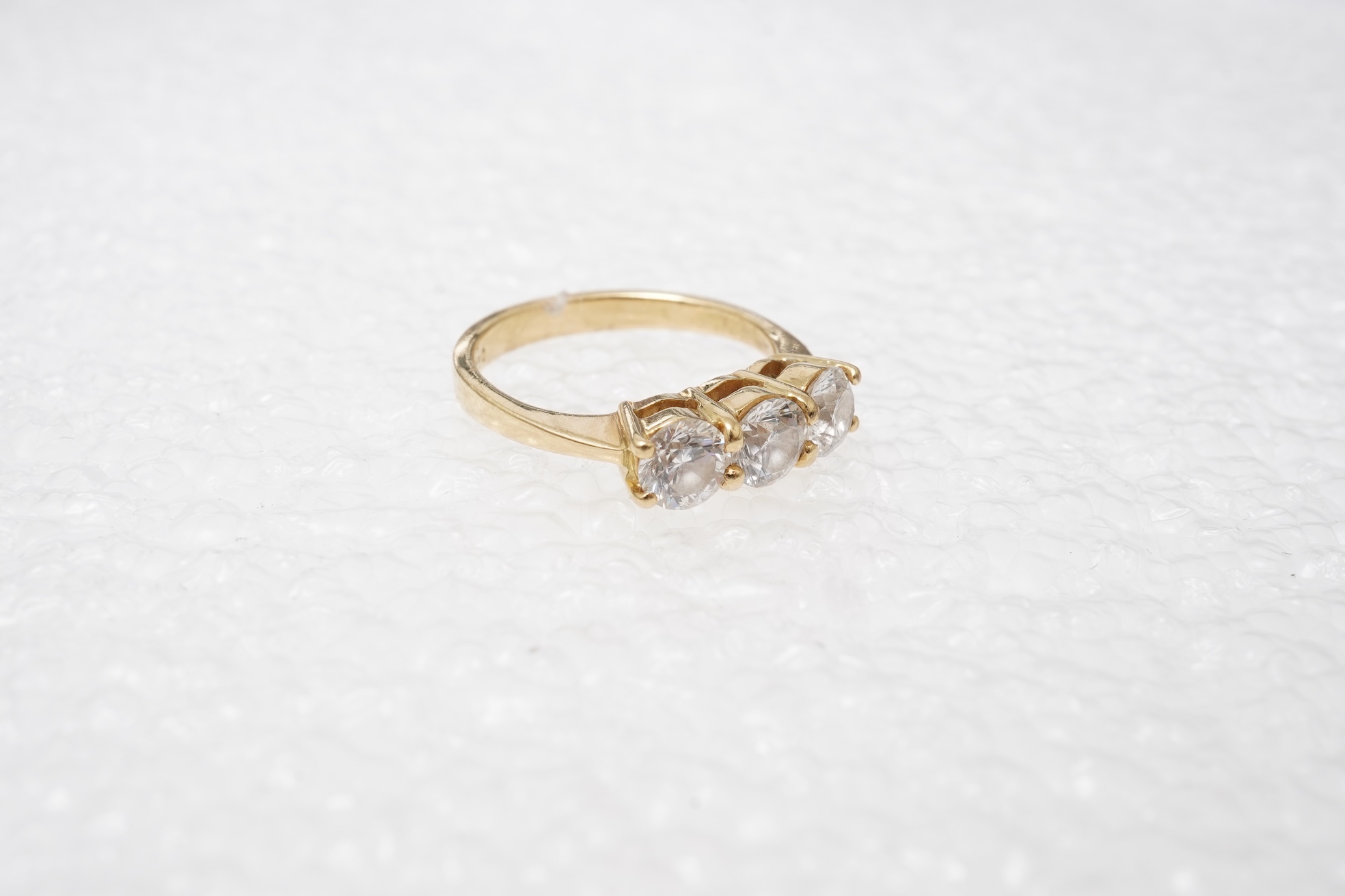 A three-stone diamond ring